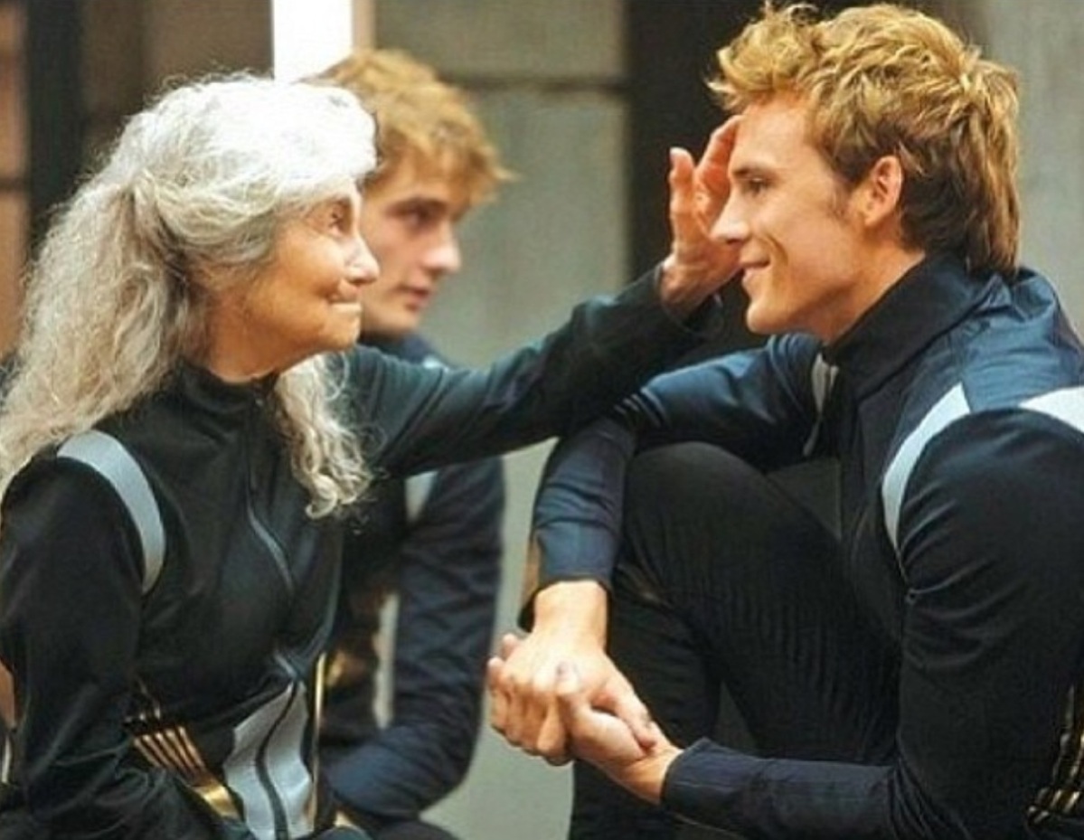 CUTE STILL of Mags & Finnick in THE HUNGER GAMES: CATCHING FIRE
